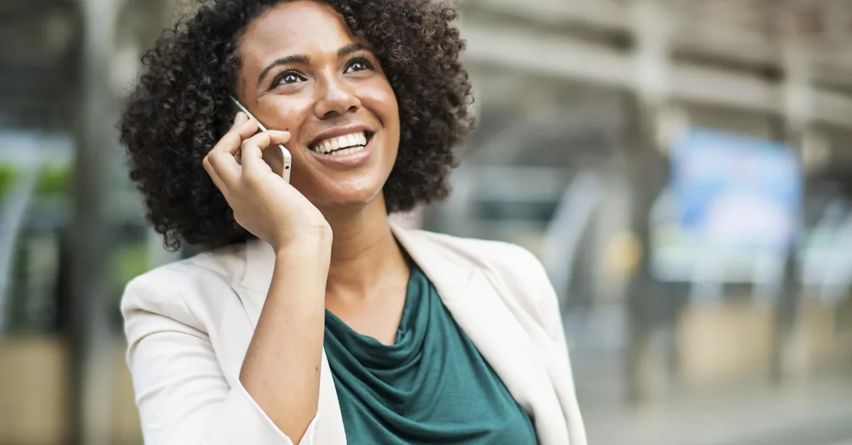 Elevator pitch examples shown through a professional woman confidently introducing herself during a brief phone conversation